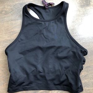 Cropped workout top with criss cross open sides